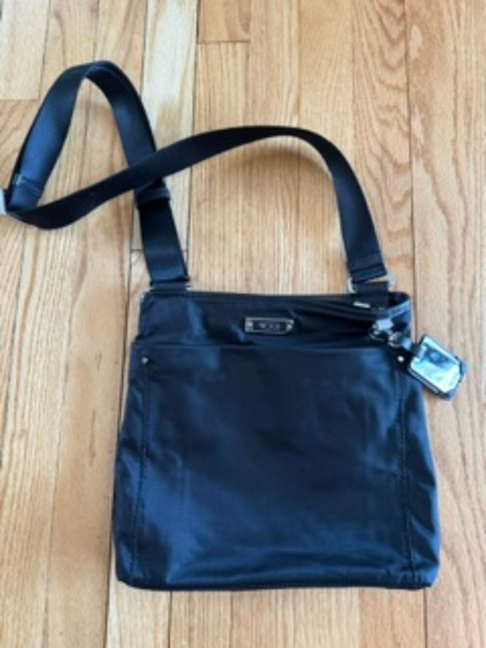 Tumi cross body bag